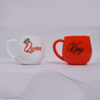 Detailed view of the King & Queen design on the couple mugs.
