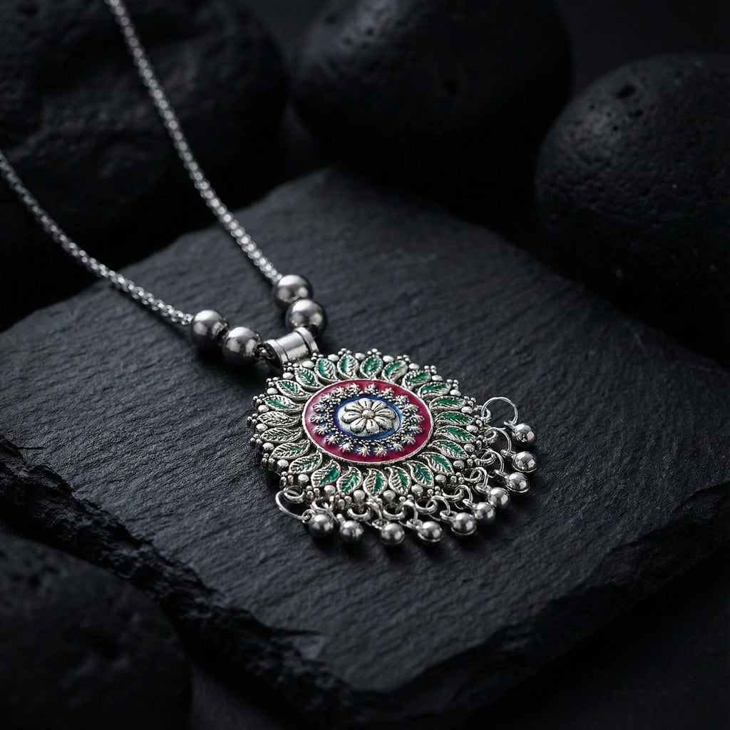 Antique silver-tone floral mandala pendant necklace with enamel accents and hanging ghungroo beads