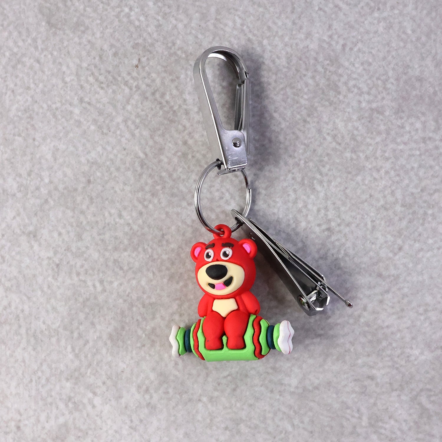 Front view of the Cartoon Nail Cutter Keychain with mixed cartoon designs