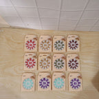 Selection of long coffin press-on nails exhibiting diverse 3D embellishment styles