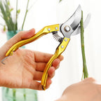 A pair of sharp garden shears from Velvet Wipe, ready for precise plant trimming.