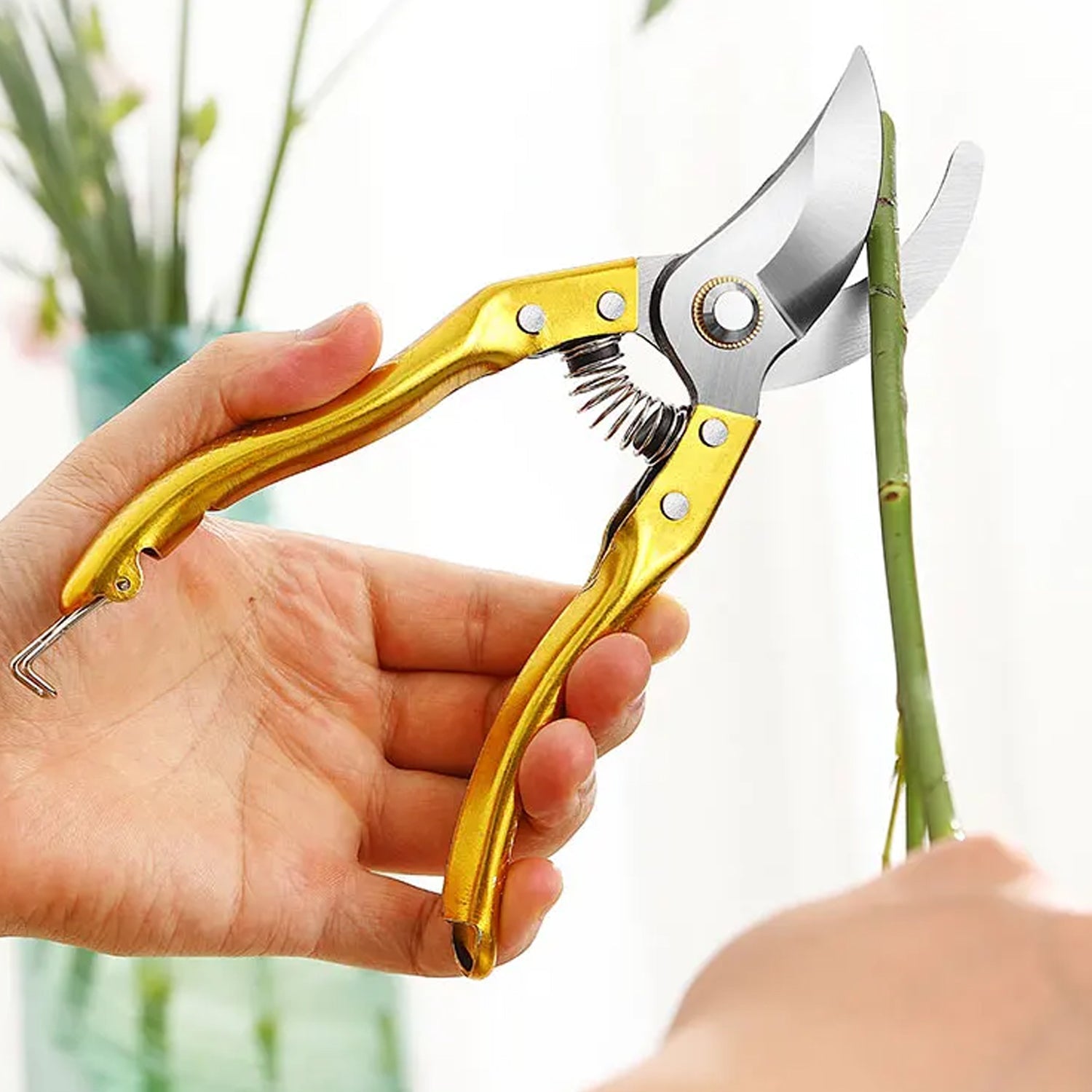 A pair of sharp garden shears from Velvet Wipe, ready for precise plant trimming.