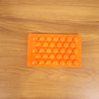 Kitchen candy making mold in orange