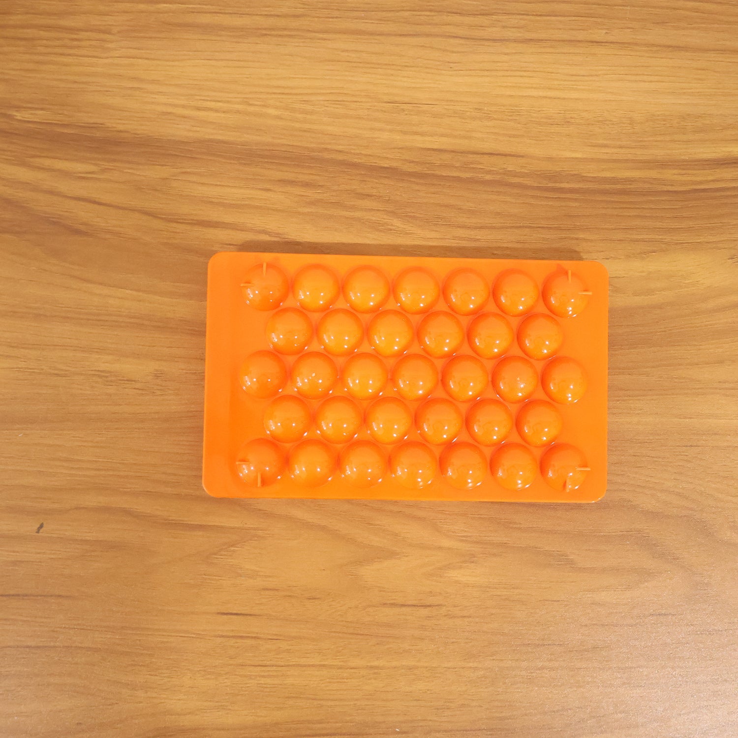 Kitchen candy making mold in orange