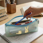 Cute cartoon printed transparent pencil pouch showcasing waterproof design for school use