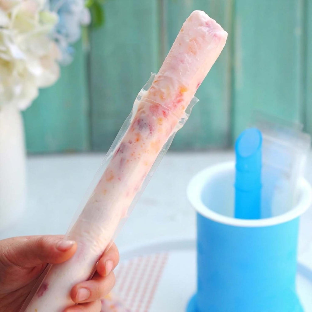 A collection of brightly colored homemade frozen treats, showcasing the versatility of the silicone molds.