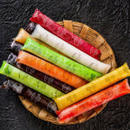 Several empty silicone ice pop molds neatly arranged on a table, ready for your creative fillings.