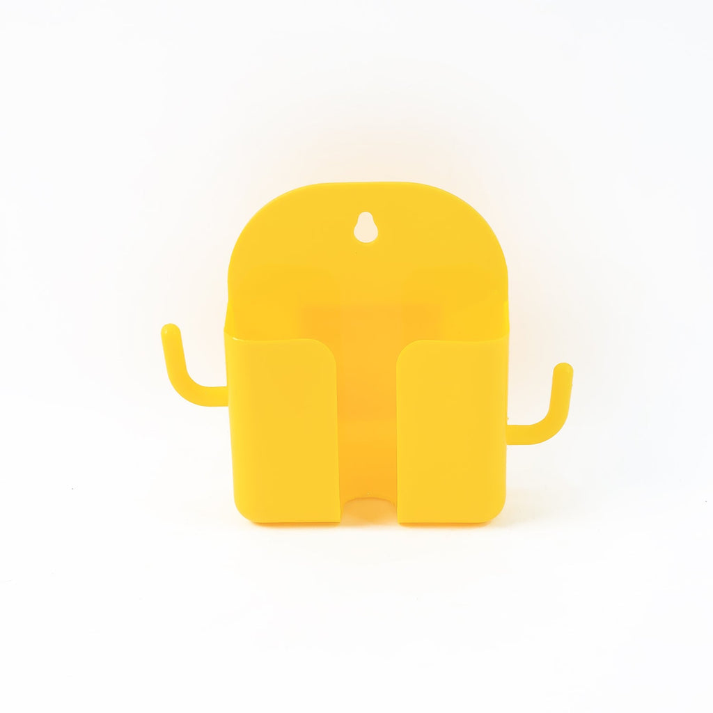 Mobile phone stand with hook holding phone and hanging accessories on wall