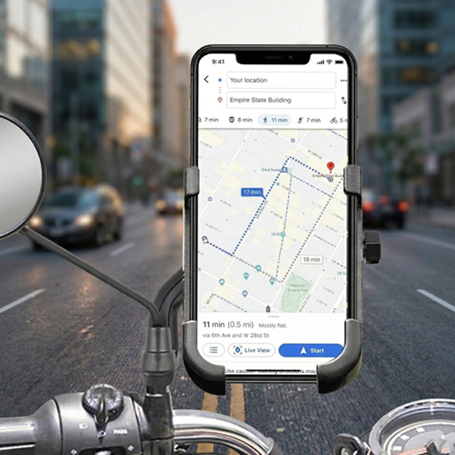 Smartphone securely held in the metal bike phone holder, attached to a rear view mirror on a bike.