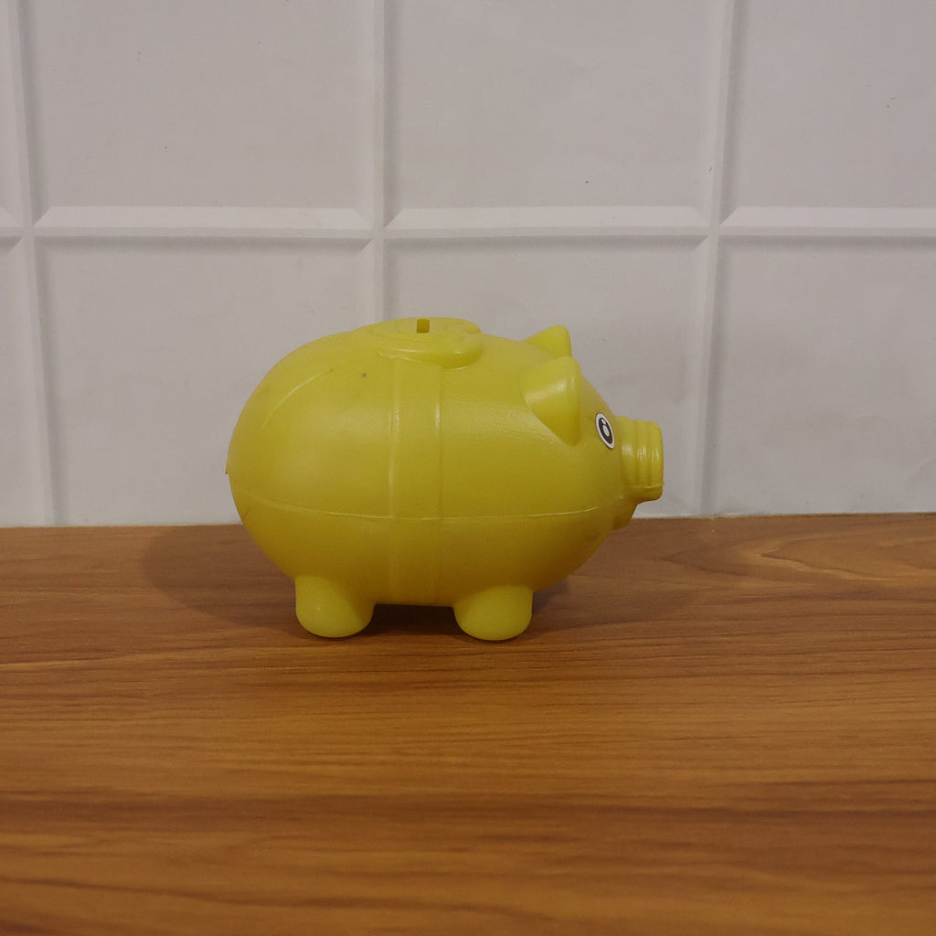 Children’s piggy money bank displayed in room