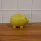 Children’s piggy money bank displayed in room