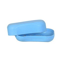 Assorted colored covered soap cases displayed together, showcasing variety.