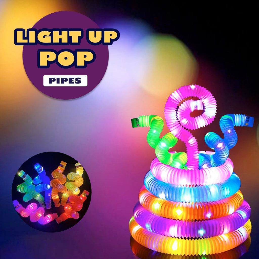 Several colorful pop tubes demonstrating their impressive stretchability.