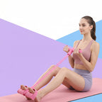 Close-up of resistance exerciser handle and foot pedal detail