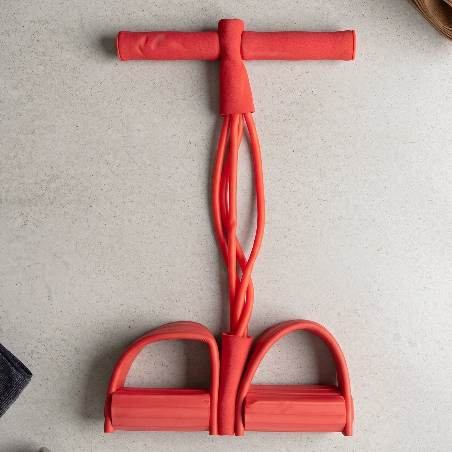 Product view of pull rope exerciser for full body workout.