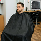 Waterproof hair cutting salon apron cape displayed on mannequin