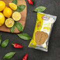 Pack of Maniarrs Lemon & Spicy Mini Slim Bites showcasing tangy and spicy snack