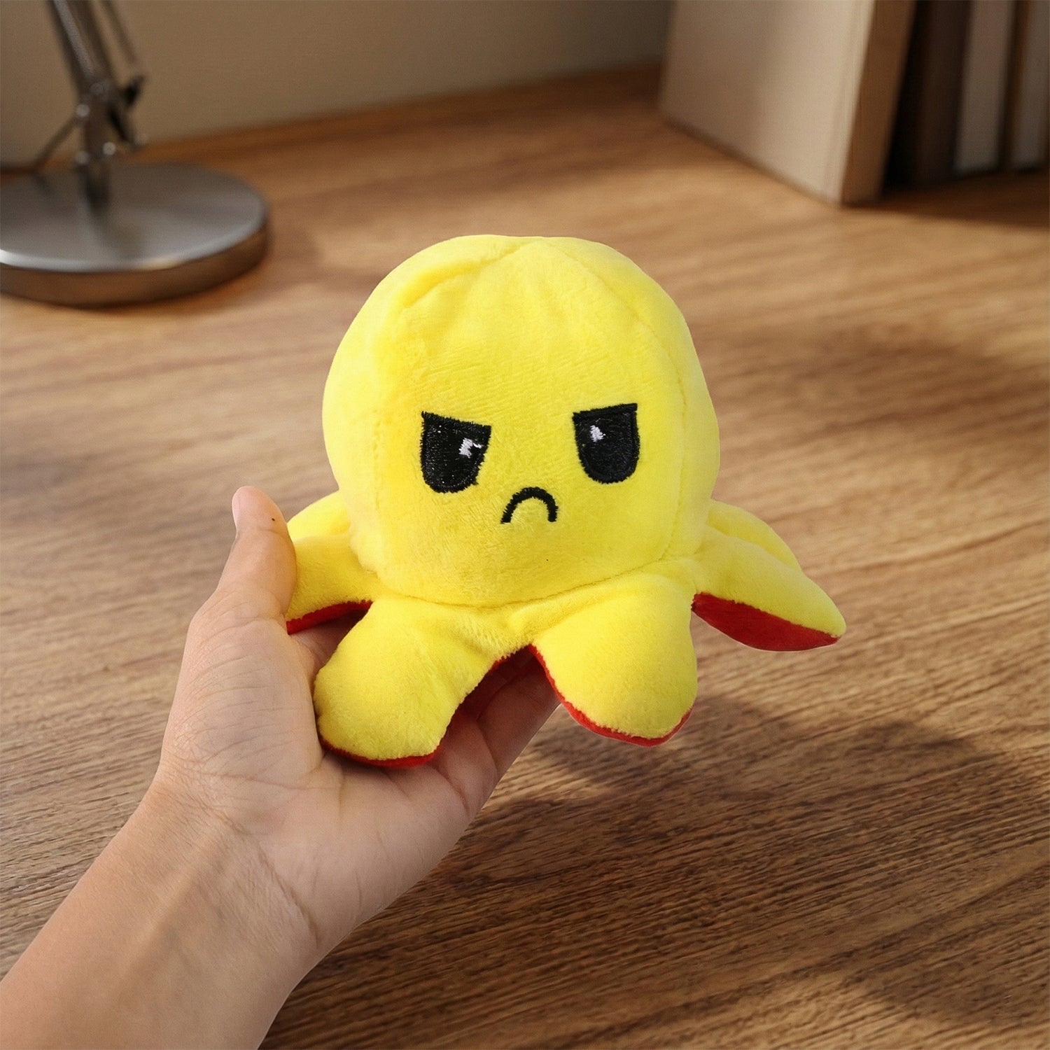 Mini reversible octopus plush toy adding charm to home or office