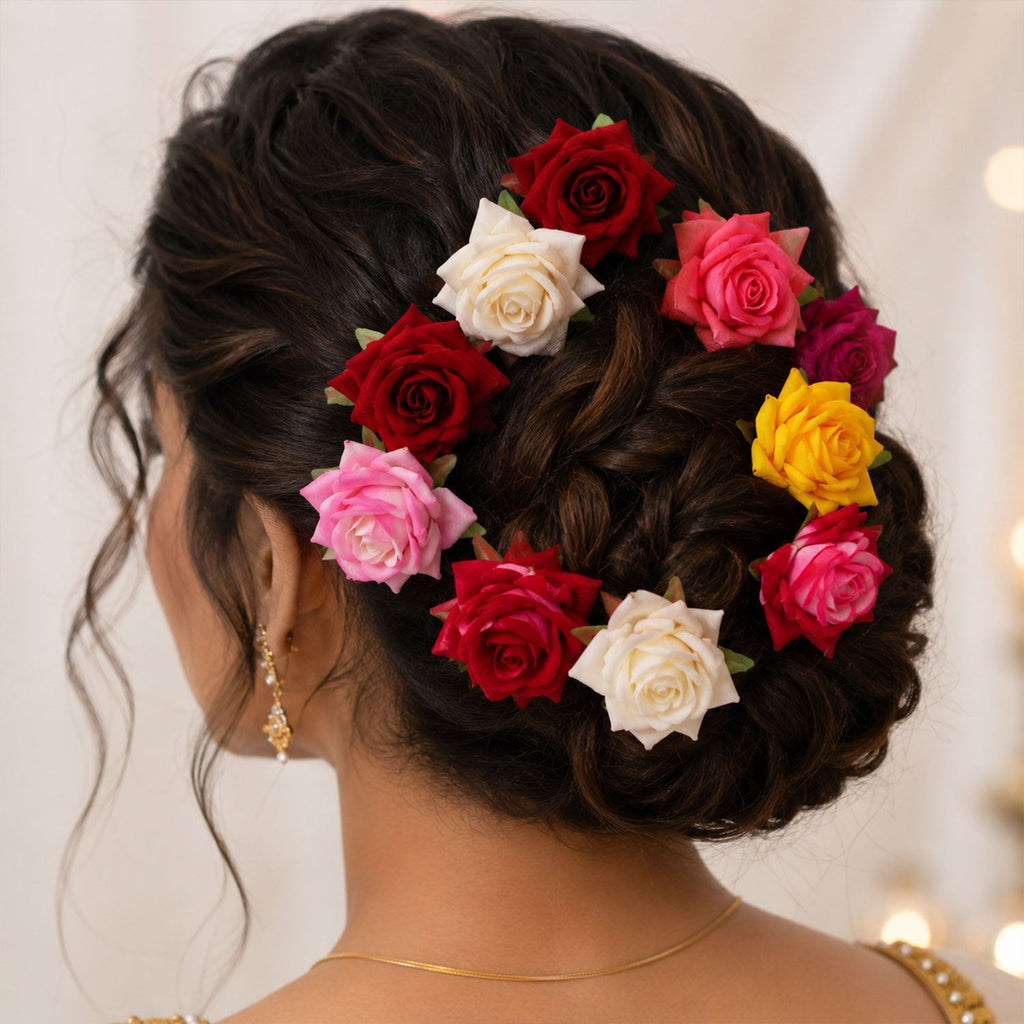 A collection of colourful flower hair pins in mixed hues, laid out for display.