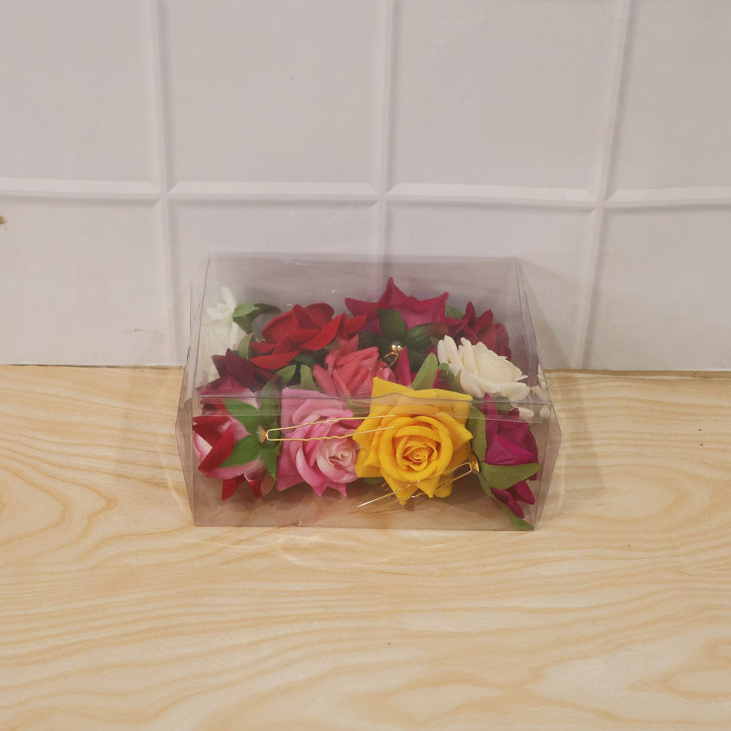 Back view of a woman's hair styled with a beautiful flower hair pin.