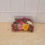 Back view of a woman's hair styled with a beautiful flower hair pin.