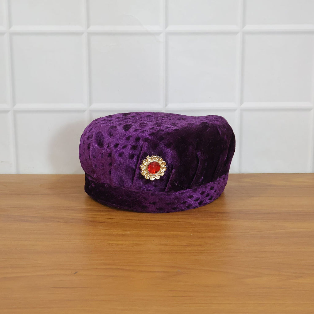Festive setting with a boy wearing velvet traditional cap