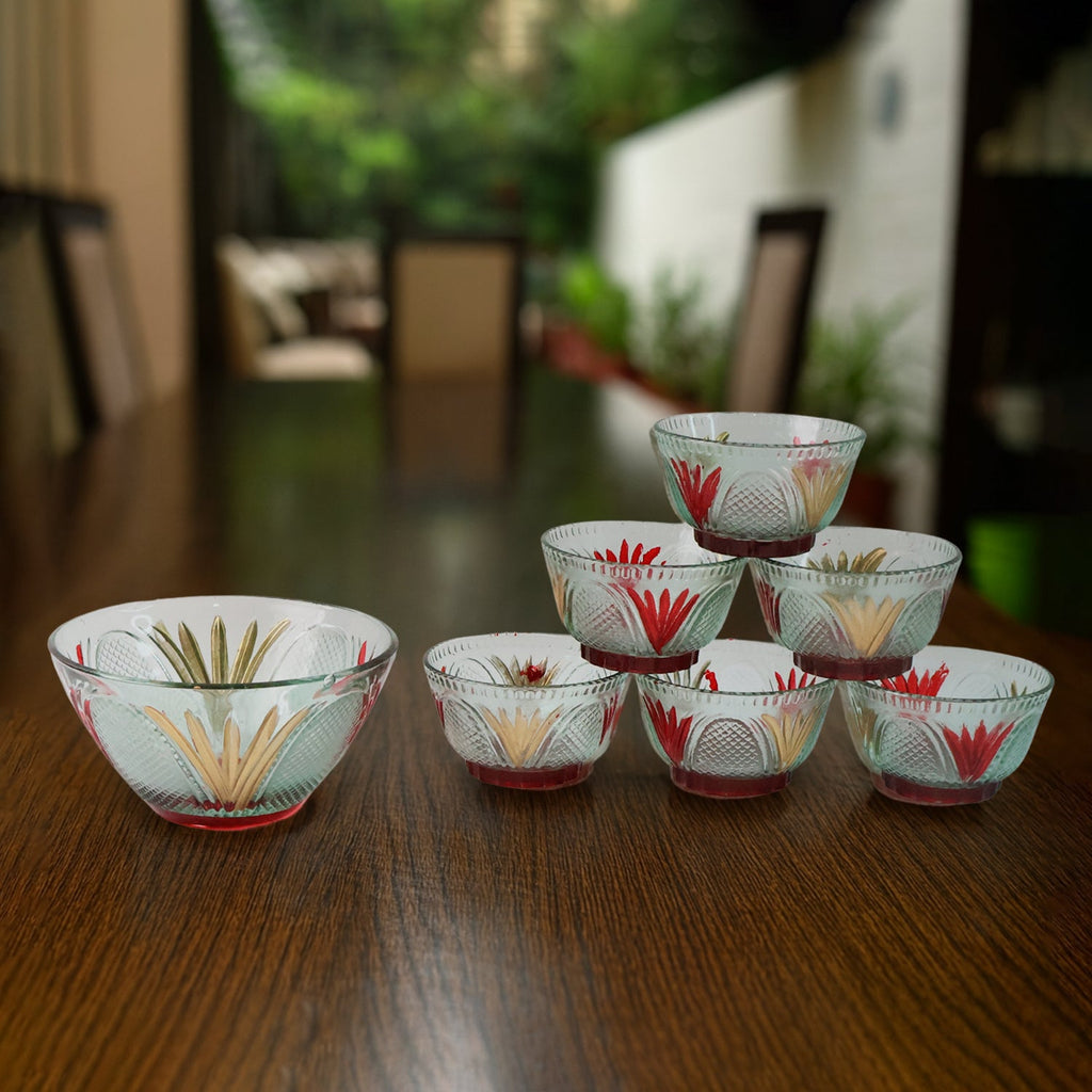 Seven-piece glass serving bowl set, perfect for various Indian desserts and snacks.