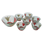 Different sizes of the glass pudding bowls, including one large and six medium.