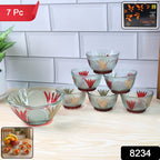 Close-up of the multipurpose glass dessert bowl with a delicate rose pattern.