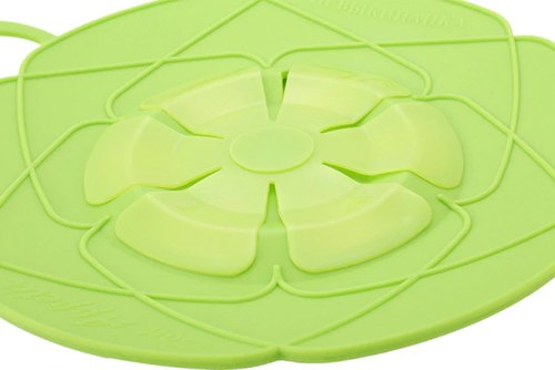 Multipurpose silicone cookware cover used as a splatter screen.