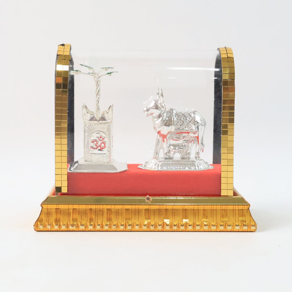 Silver-plated decorative Kamdhenu cow pooja idol in acrylic frame