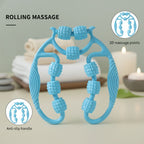 Detailed view of textured rolling balls on handheld massage roller