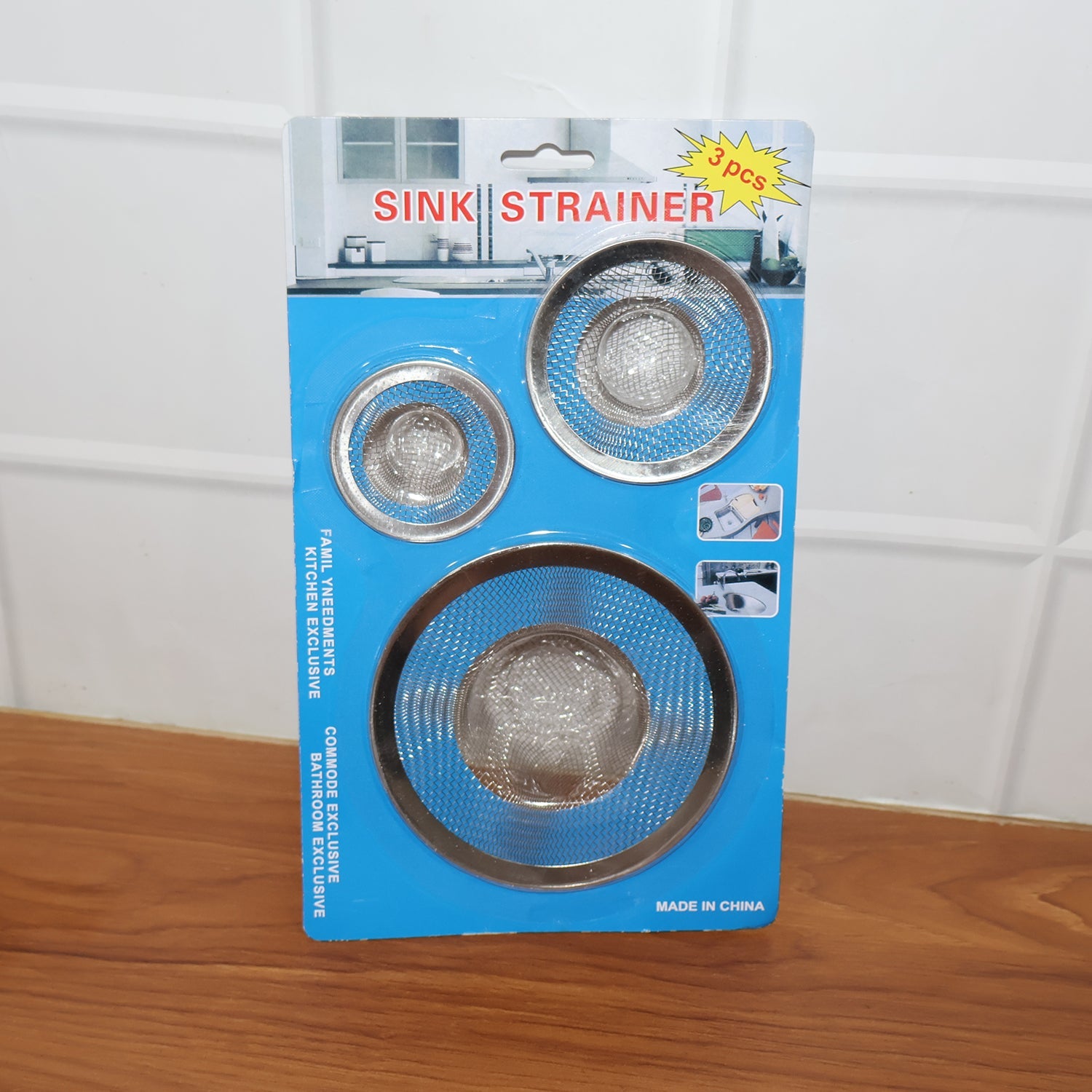 Stainless steel sink drain strainer in use filtering drain water