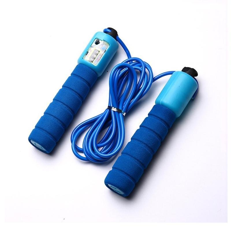 Person exercising with a digital counting skipping rope.