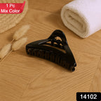 Close-up image of durable plastic triangle hair claw clip with spring mechanism