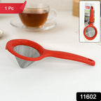 Close-up of fine stainless steel mesh on green tea strainer filtering tea leaves