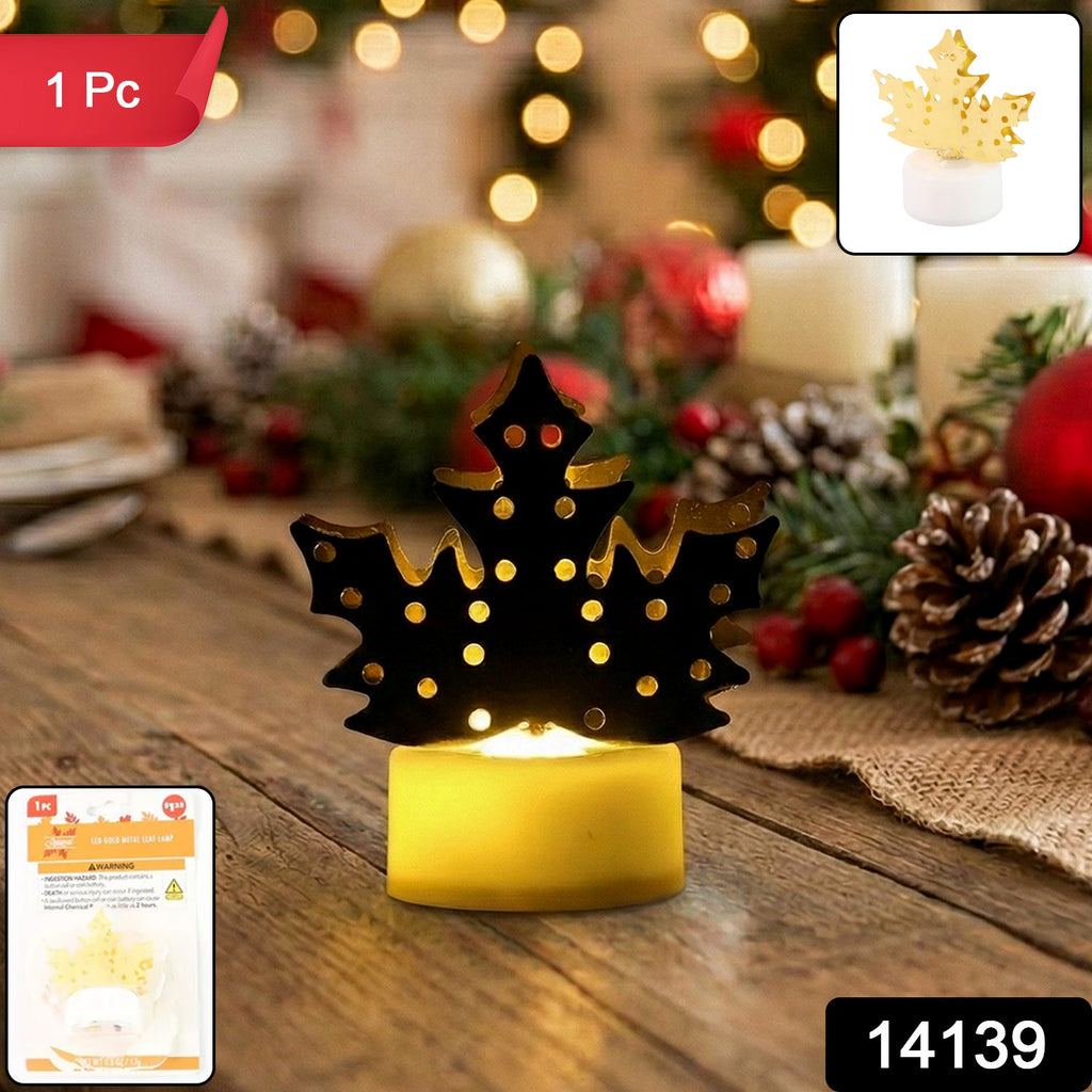 Close-up of decorative LED gold metal leaf diya lamp with warm flickering light