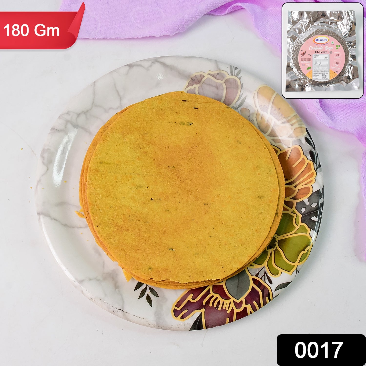 Close-up view of Maniarr's Chatpata Bajri Khakhra packaging, highlighting product details.