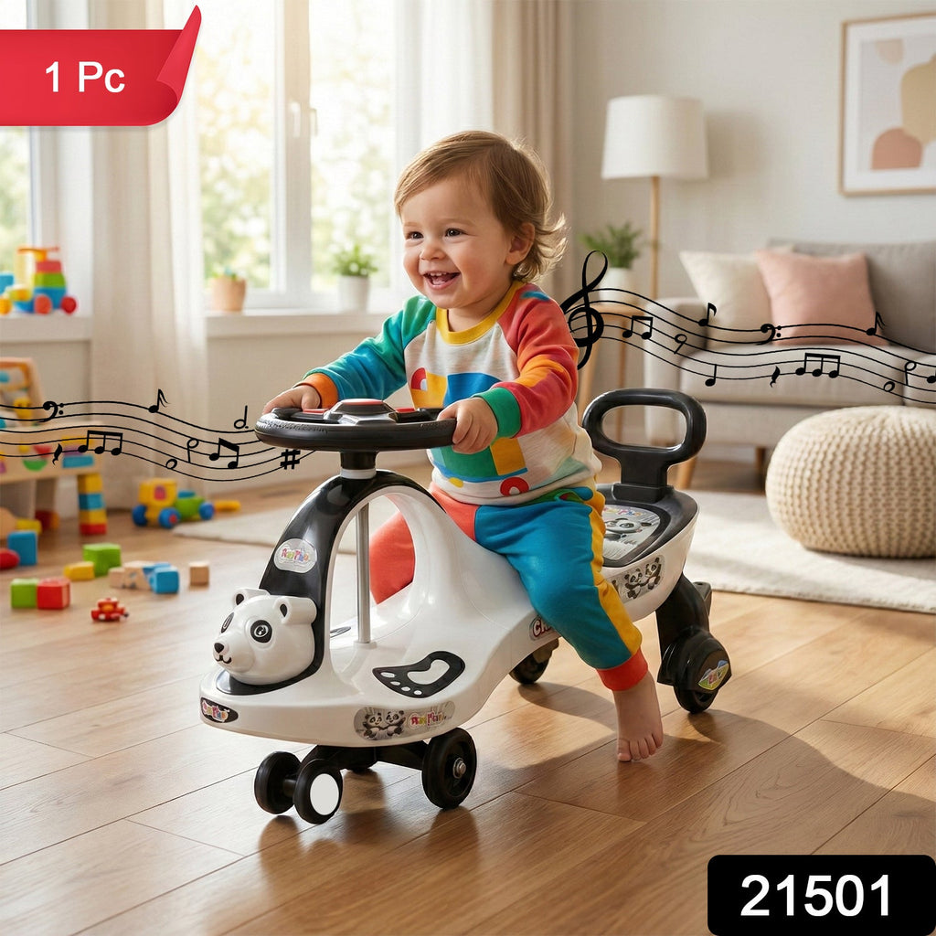 Close-up of child enjoying baby ride-on swing car toy with music