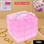 Top view of the transparent plastic organizer box showing 18 adjustable compartments.