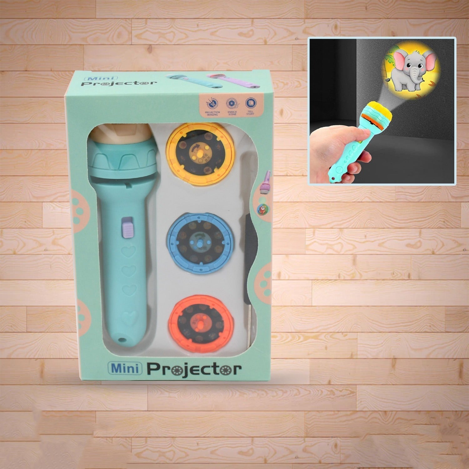 A child's hand holds the Mini Slide Projector for Kids, projecting a colourful animated pattern onto a wall.