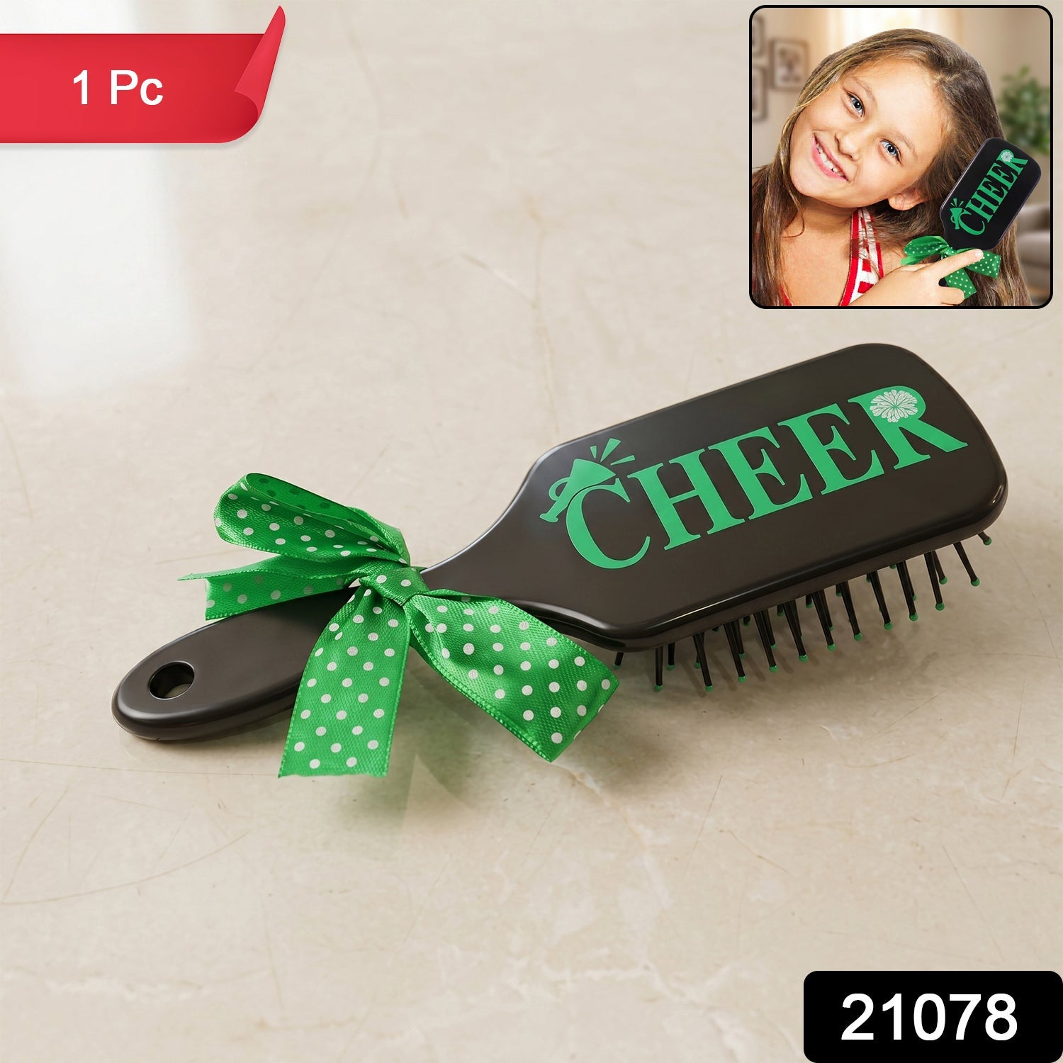 Cute printed kids hair brush featuring a ribbon bow handle, ideal for daily grooming.
