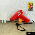 Close-up of the hot melt glue gun's ergonomic handle and trigger.
