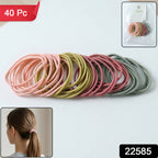 Close-up of soft elastic hair ties in neutral shades, gentle and secure