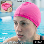 Pink silicone swim cap in vibrant pink color