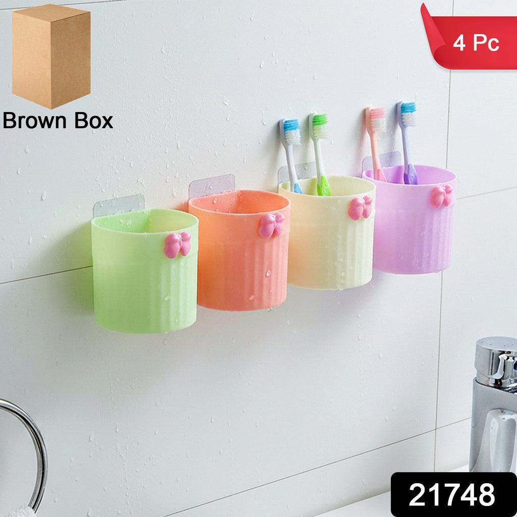 Bathroom toothbrush organizer set mounted on wall with toothbrushes and toothpaste