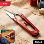 Thread cutter scissors trimming fabric in sewing and crafting