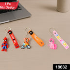 Close-up of a cute 3D cartoon silicone keychain with a metal hook and strap.