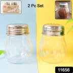 Two spice shakers in Oregano and Chilli Flakes set showing easy pour spout lids