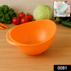 Hand holding a durable plastic rice washing bowl with water, demonstrating its efficient straining.